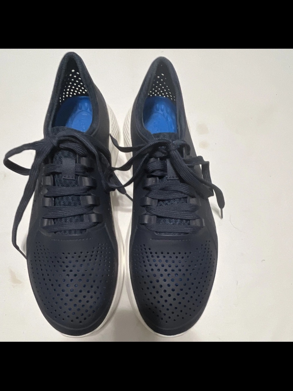 CROCS black Perforated Lace-Up Sneakers with White Sole. Normal wear on soles.